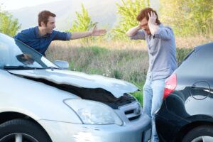 Drivers arguing who should pay for the damages.