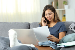 An injured woman crying after her social security disability claim is denied in Colorado Springs.