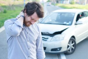 A man is injured in a car wreck in Colorado Springs, CO.