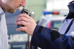 Police officer gives alcohol test in Colorado Springs.