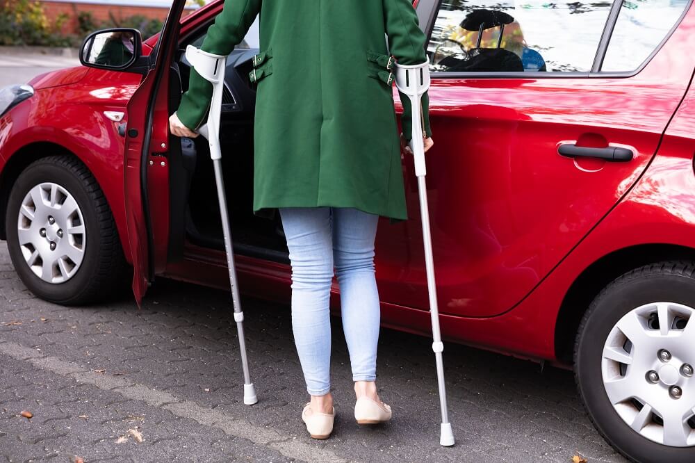 lady driver crutches