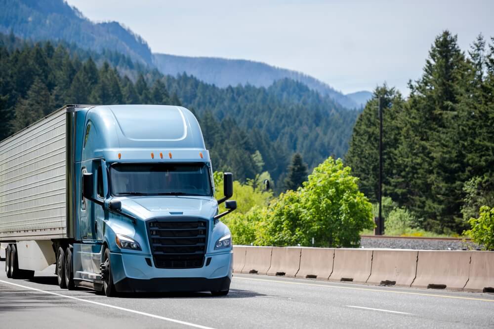 Truck passing in the countryside road of Colorado.